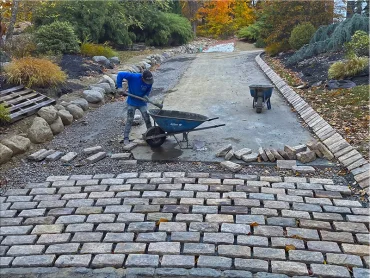 Belgium block edging crew setting stones in Morris County NJ